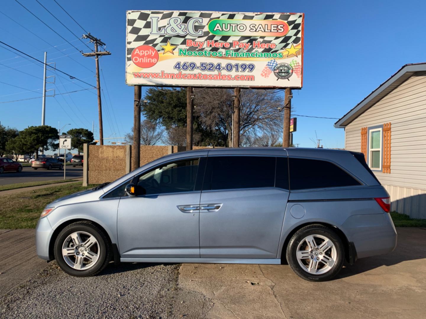 2012 Blue /gray Honda Odyssey Touring (5FNRL5H94CB) with an 3.7L L5 DOHC 20V engine, AUTOMATIC transmission, located at 1830 North Belt Line Road, Irving, TX, 75061, (469) 524-0199, 32.834373, -96.993584 - Photo#0